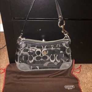 Black and grey signature Coach handbag
